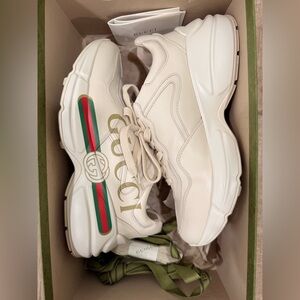 Authentic Women's Rhyton Gucci logo leather sneaker